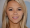 Ashlynn Brooke l&auml;chelt.